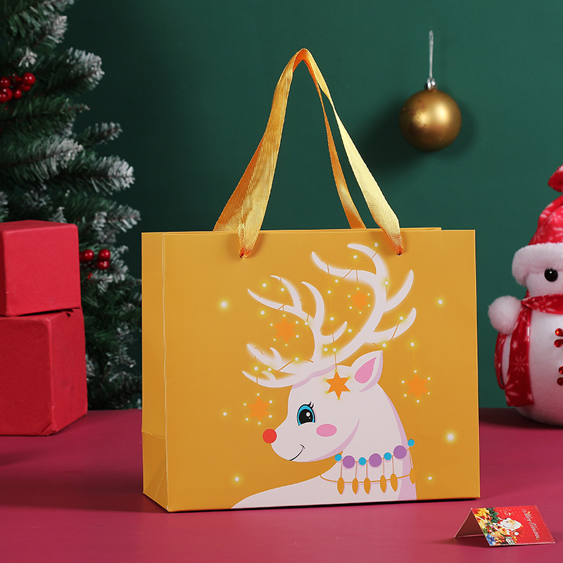 新しいクリスマスの現物のヘラジカのサンタクロースの漫画の贈り物の袋の厚い横の金のリンゴの袋の手提げの紙袋|undefined