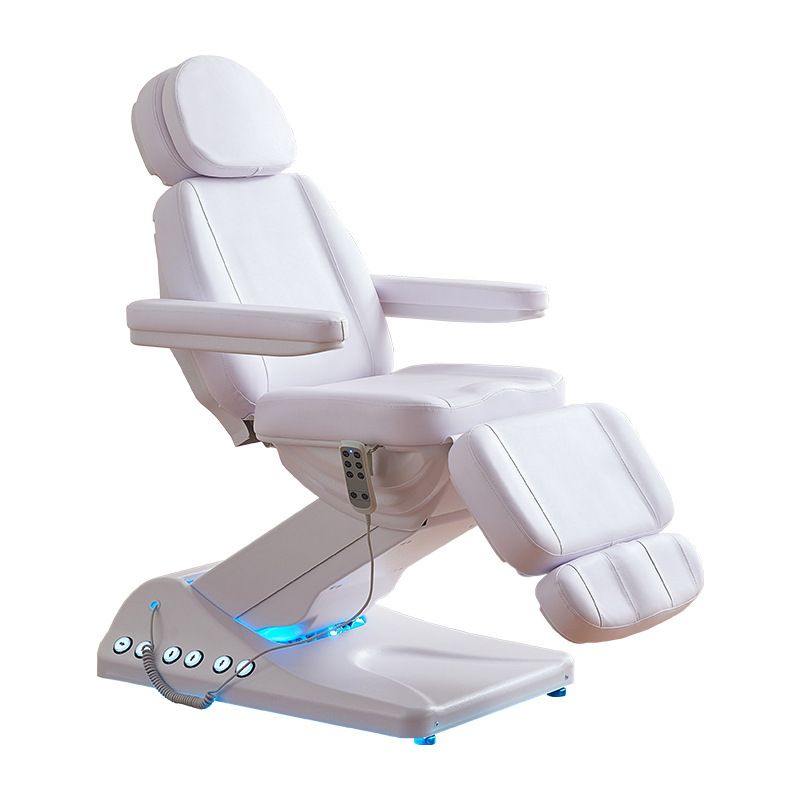 Cama de masaje y tatuaje de alta gama con suministro directo de fábrica, cama de belleza eléctrica plegable con elevación automática para salón de belleza.