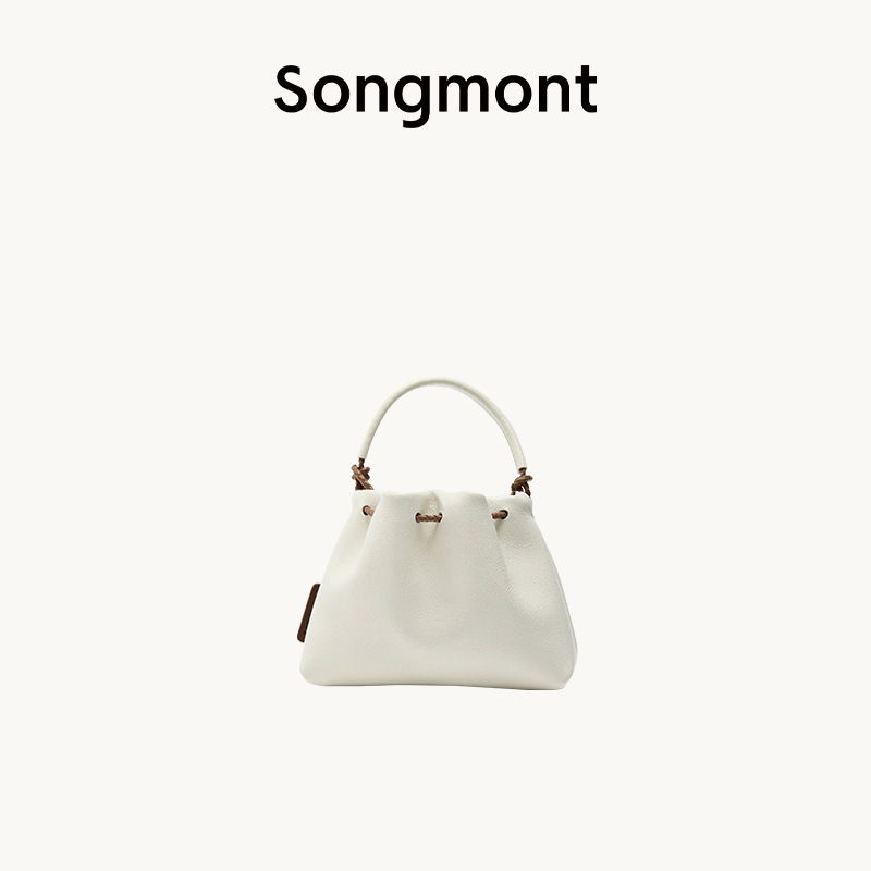 Hay un tubo giratorio de pino, piedra, semillas de Bodhi, calabaza, taza de alivio de preocupaciones