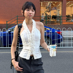 フランス式の純粋な欲望のハスの葉の縁に首の袖のないキャミソールのカーディガンを掛けます。
