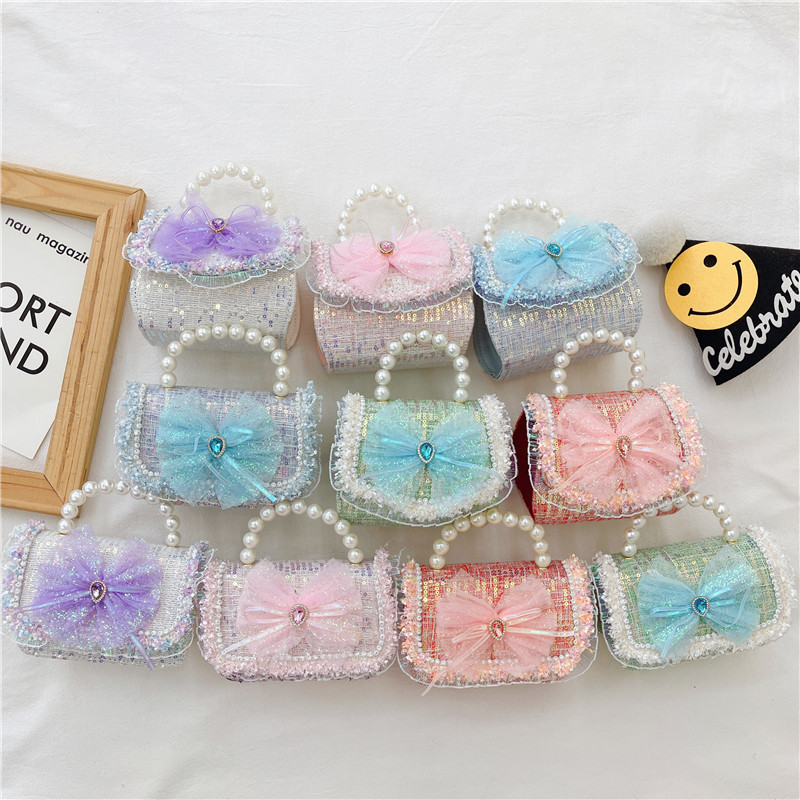 Nuevo bolso infantil de moda de verano, bolso de cinturón, bolso de princesa de perlas, bolso de cambio de viento fragante