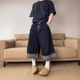 工厂直销水洗新款拼接毛边牛仔裤子男2025夏宽松多口袋排扣七分裤