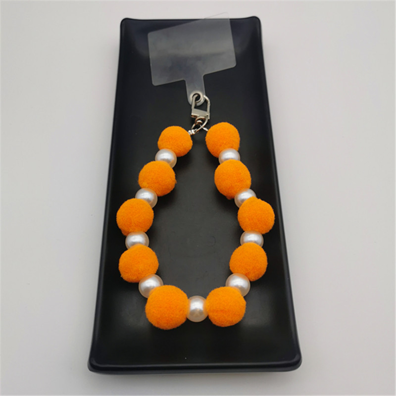 Nueva Bola de piel de cadena de perlas colgante Cadena de teléfono móvil ins Internet celebridad mismo estilo muñeca de invierno pulsera peluda cadena portátil