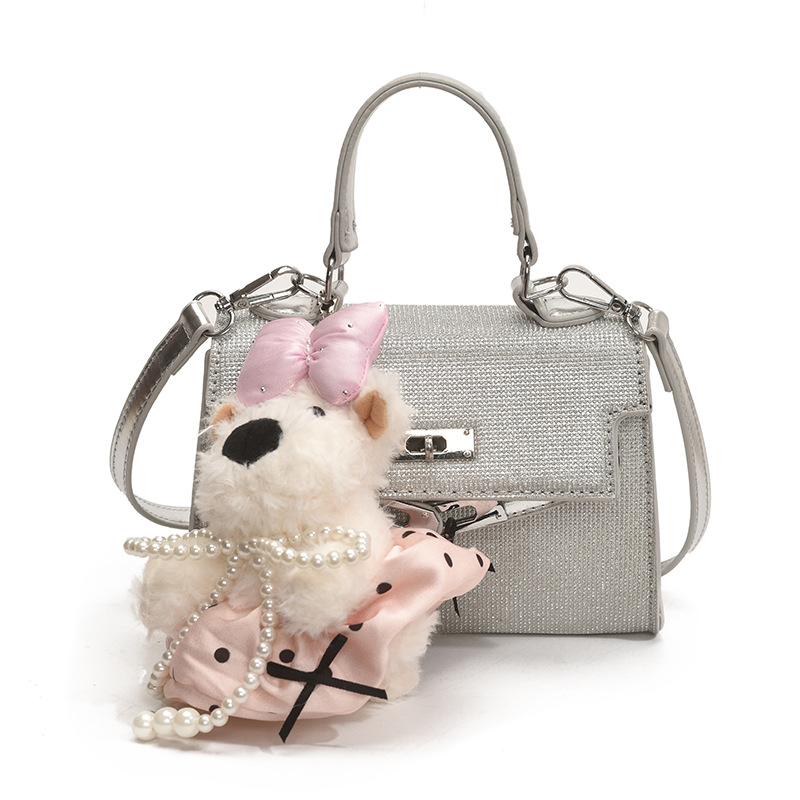 Bolso Kelly portátil de alta gama de moda transfronteriza para mujer 2025 nuevo estilo salvaje estilo occidental color sólido bolso de mensajero casual de un solo hombro