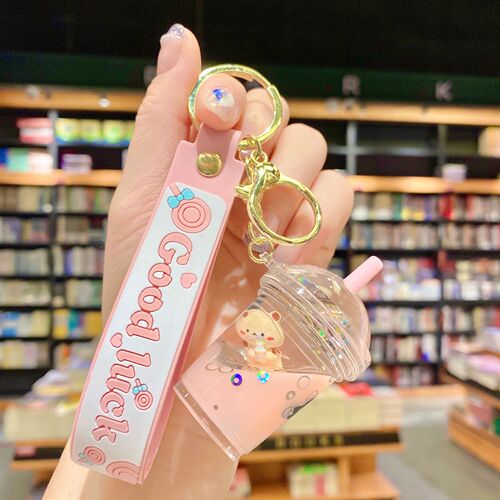 Internet celebrity cartoon oil floating pearl milk tea bear keychain female cute trendy car key chain school bag pendant