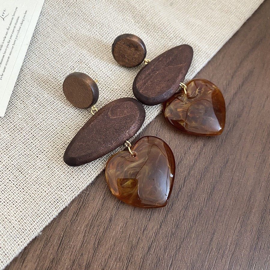 Aguja de plata Pendientes geométricos Maillard Pendientes de lujo ligero retro de nicho Pendientes de temperamento de todo fósforo de moda Sentido de alta gama al por mayor