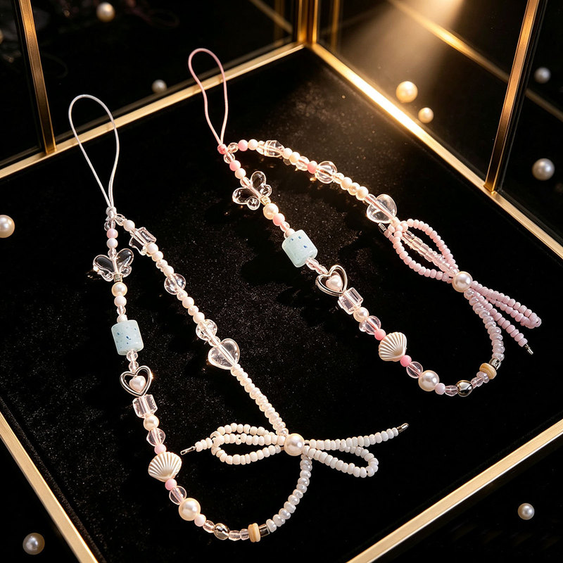 Korean-style girl's bowknot beaded phone chain, shell heart pearl phone strap, ins-style phone case accessory