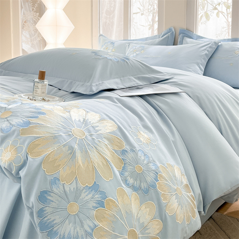 Cama de cuatro piezas de algodón puro algodón 2025 nuevo estilo ligero de lujo bordado funda edredón sábana ropa de cama de alta calidad traje de cuatro piezas ligero