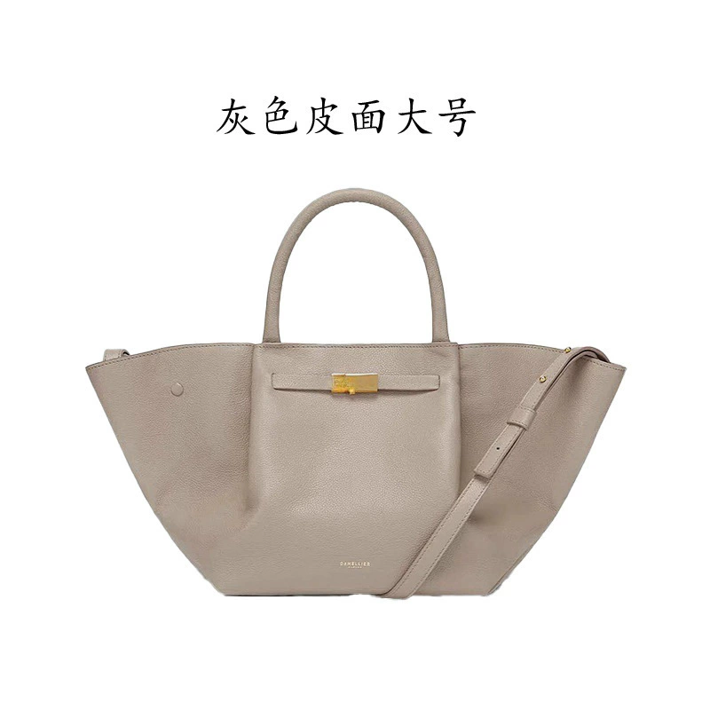 Handheld capacious purse, shoulder bag