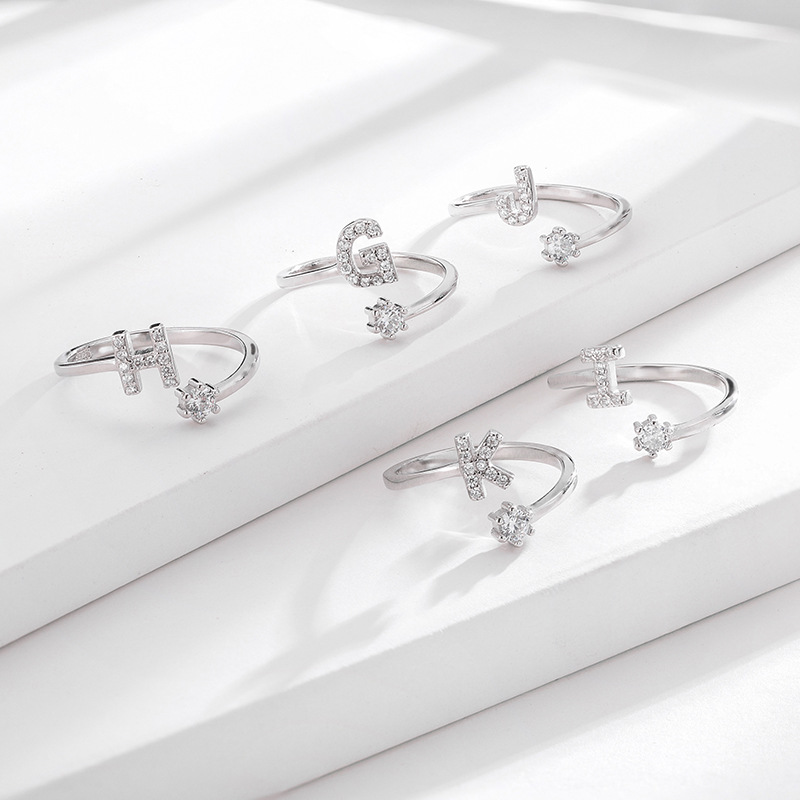 Amazon popular s925 plata esterlina 26 inglés letra anillo europeo y americano moda abierta diamante anillo pulsera de las mujeres
