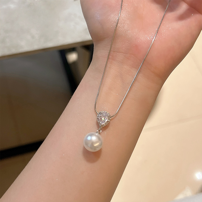 S925 スターリングシルバーリボンウォータードロップジルコンネックレス女性のニッチデザインハイエンド韓国インライト高級鎖骨チェーン|undefined