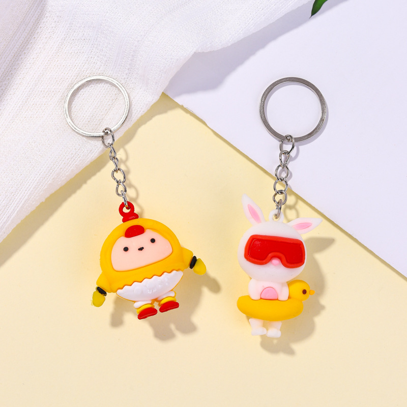 Nuevos llaveros de dibujos animados Capibara conejo blanco huevo colgante de fiesta mochila decoración