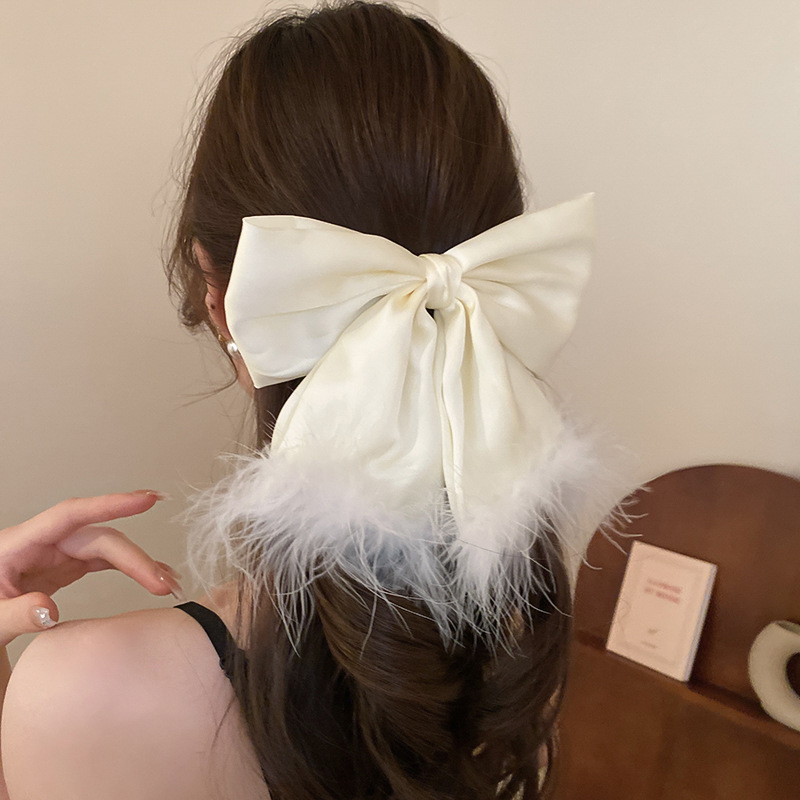 Women's Simple Style Bow Knot Alloy Cloth Feather Hair Clip display picture 20