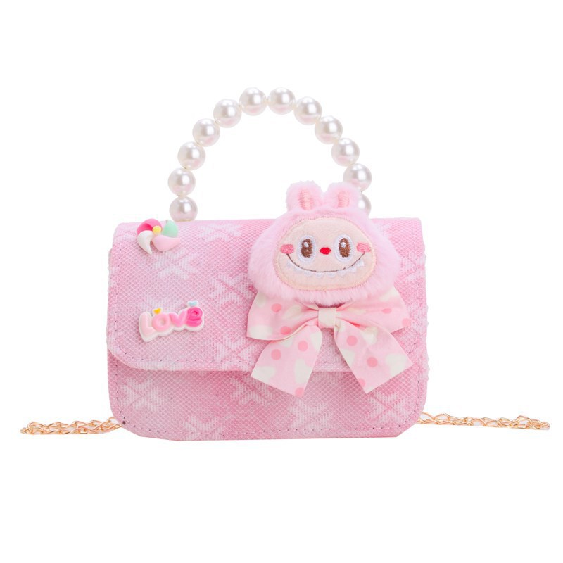 Bagos para niños 2025 nuevo estilo coreano de niña princesa bolso de cambio de mano lindo bolso de hombro de dibujos animados de peluche