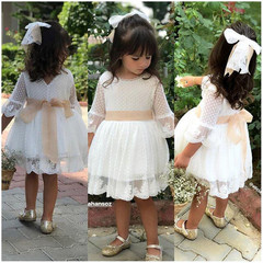 A new girls' lace dress with a back bow tie, featuring a net fabric, for little girls to wear as princess dresses.