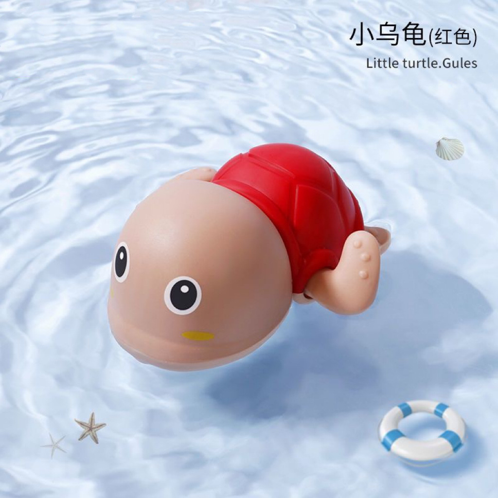 Red turtle playing in water