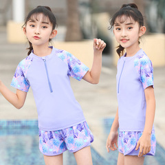 女の子の水着の子供の高級感2025の新型の分体セットの中で大きい子供の専門は水着の卸売りを訓練します。