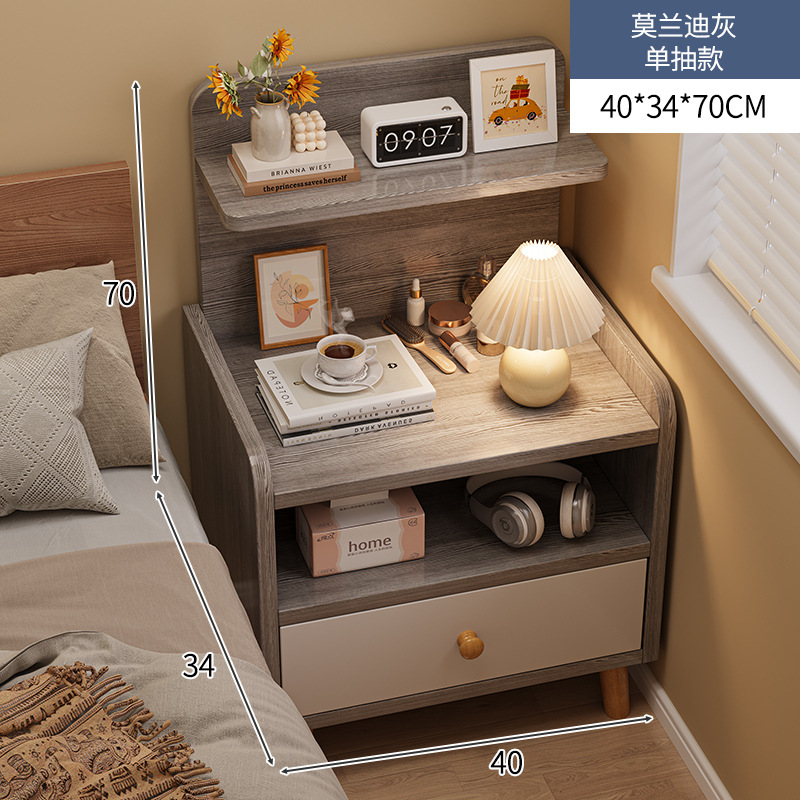Mesilla de noche simple y moderno armario de almacenamiento de pierna de madera maciza pequeño dormitorio simple hogar 2025 nuevo estante de cabecera