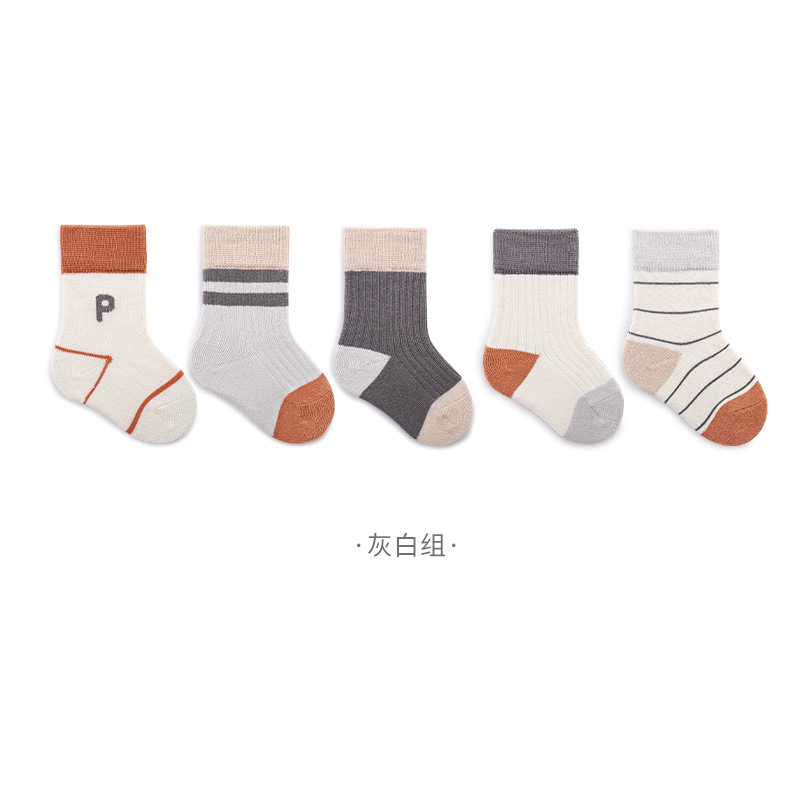 Calcetines para niños 2023 primavera nueva moda calcetines estudiante estilo universitario niños y niñas calcetines de algodón sueltos calcetines de media pantorrilla