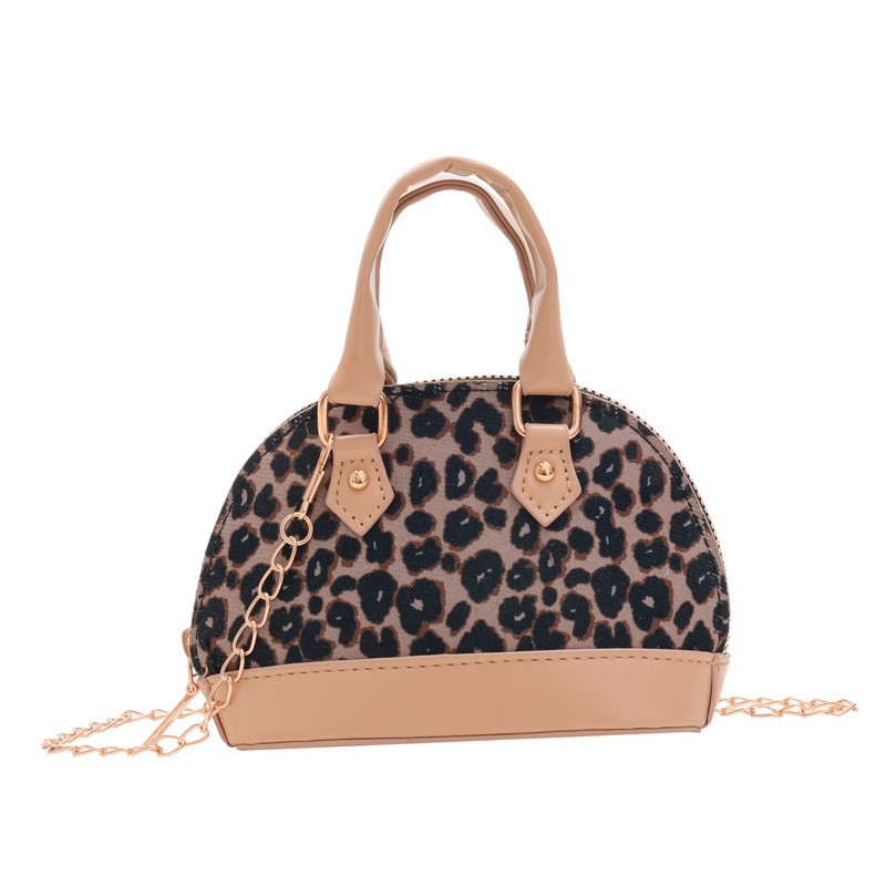 Exquisita y compacta bolsa de niña estampado leopardo extranjero mini bolso de cadena bebé nuevo estilo coreano bolso de conchas para niños