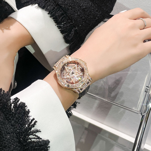  new women's watch DIMINI hollow transparent rotating rhinestone light luxury five-pointed star watch for women