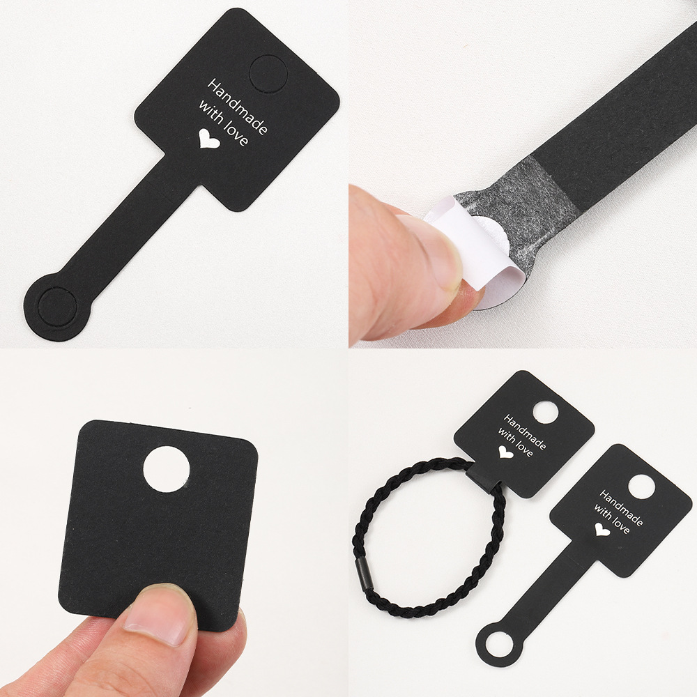 Tarjeta de embalaje adhesiva transfronteriza anillo de pelo joyería plegable Tarjeta de exhibición de cartón Tarjeta de pulsera de anillo de pelo al por mayor