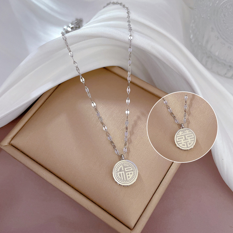 Collier femme symbole fu double face en or véritable bijoux_voghion.com