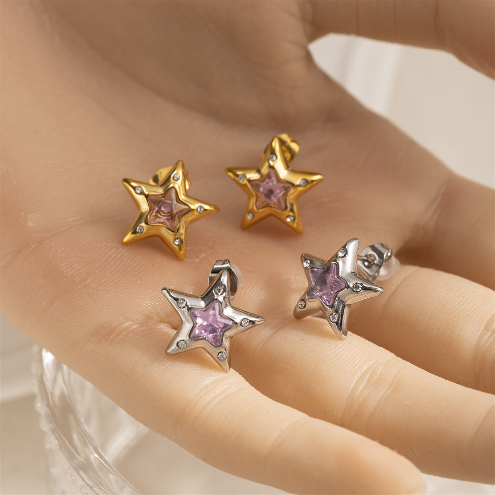 Taena Pendientes de acero inoxidable europeos y americanos Pendientes de estrellas de moda de nicho de lujo ligero y de alta gama Pendientes de acero de titanio para mujer transfronterizos
