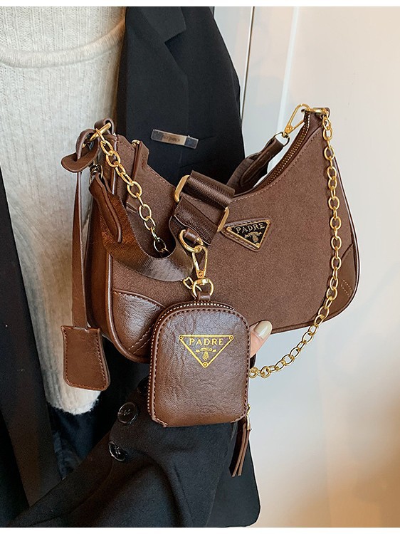 Bolso de cuero suave retro nuevo estilo transfronterizo para mujer 2024 nuevo bolso de media luna esmerilado cadena de sentido premium mensajero de un solo hombro