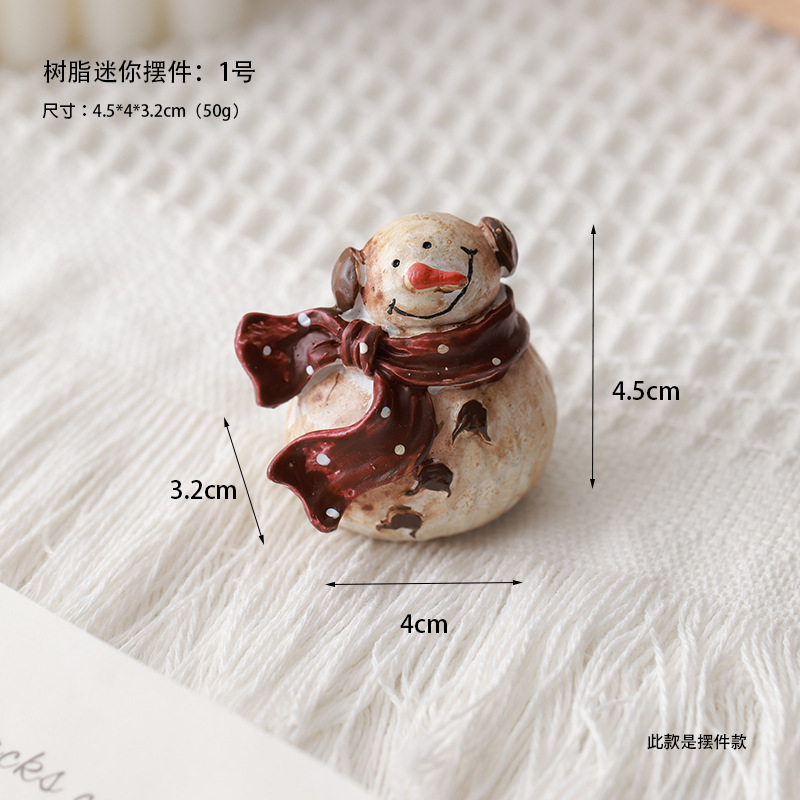 Buscando madera transfronteriza nueva decoración navideña resina muñeco de nieve decoración de escritorio retro micro paisaje diseño de props