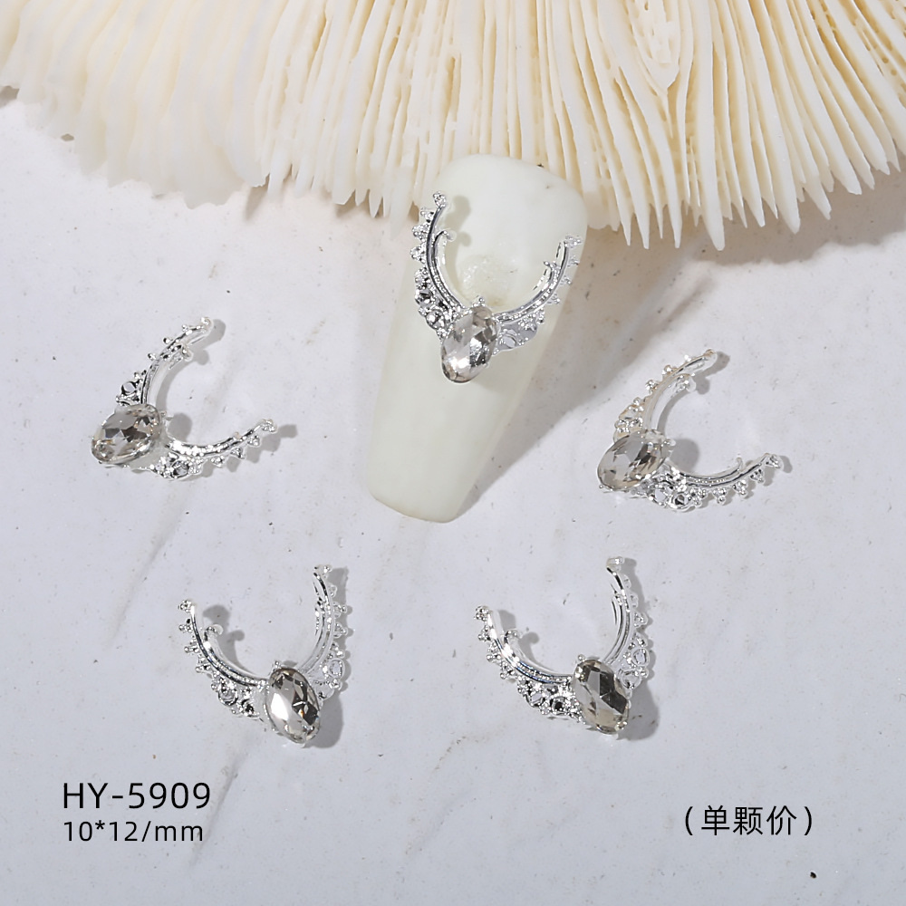 Venta caliente taladro de uñas arco de plata joyería tridimensional flash diamante esmalte de uñas decorativo diamante acabado pieza de uñas traje de joyería