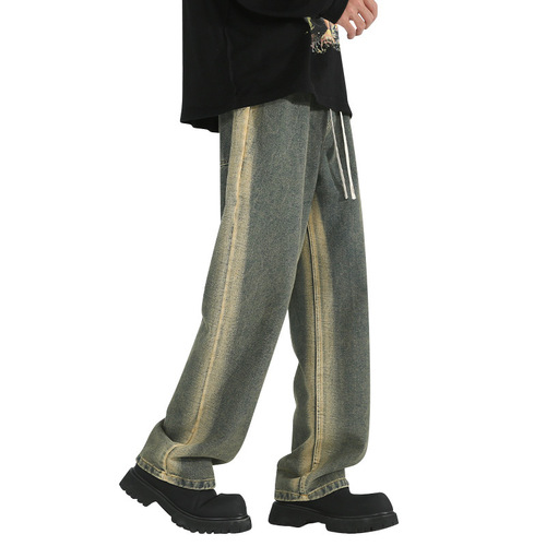 Vintage-style distressed washed denim jeans for men—trendy, loose-fit, straight-leg casual trousers for spring and autumn