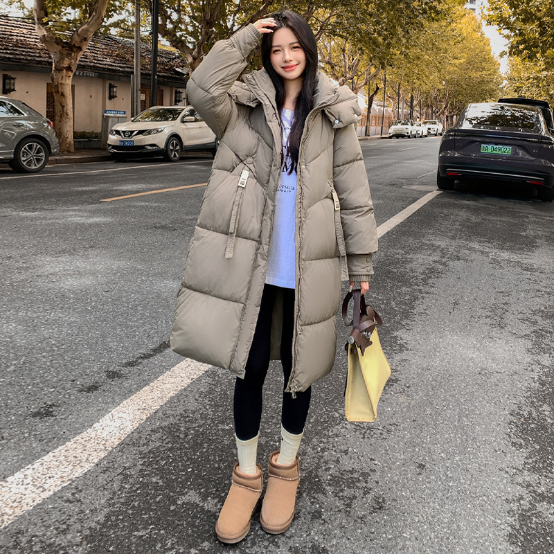 2025 nueva mujer de invierno largo y medio engrosado chaqueta de algodón de pluma caliente con capuchón grueso chaqueta de algodón de color sólido