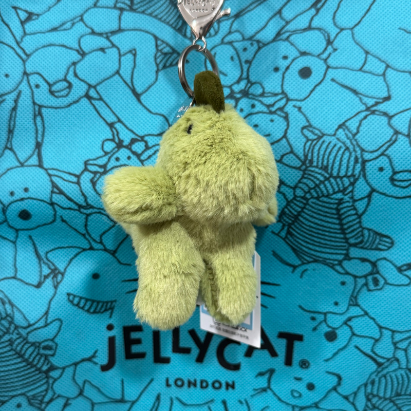 Green dinosaur pendant