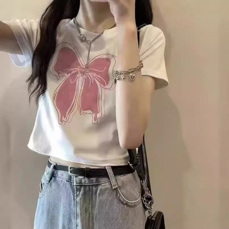 Camisas de mangas cortas americanas de alta calle caliente para mujeres 2026 verano delgado cintura alta ombligo corto de moda impresa blusa