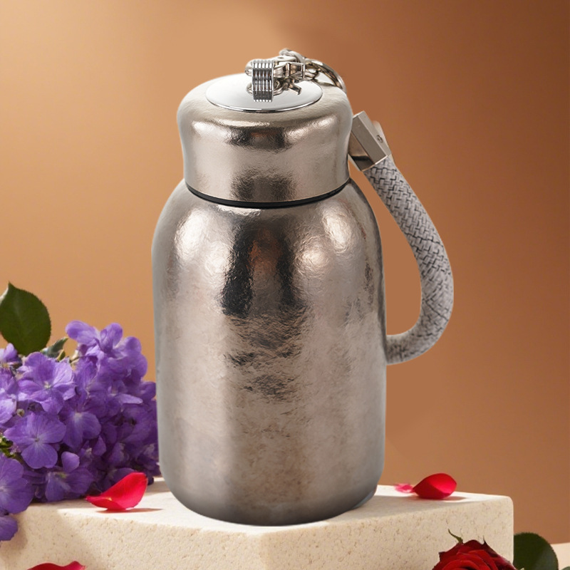 Taza de aislamiento de titanio puro de alto valor nominal de doble capa de titanio taza de bolsillo creativa taza de agua compacta y conveniente taza de negocios de alta calidad para hombres y mujeres