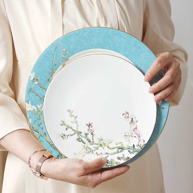 Luz de lujo traje de café combinación europea de alta gama de lujo hueso China taza de agua lujo británico tarde juego de té vajilla