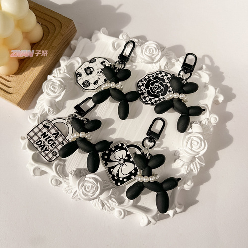 Xiaoxiangfeng fresh and sweet balloon dog ins keychain camellia pendant personalized keychain women's bag pendant