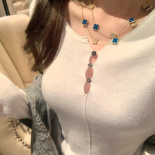 2025新款小众别致浅米白镂空针织衫女装秋冬修身显瘦减龄新款上衣