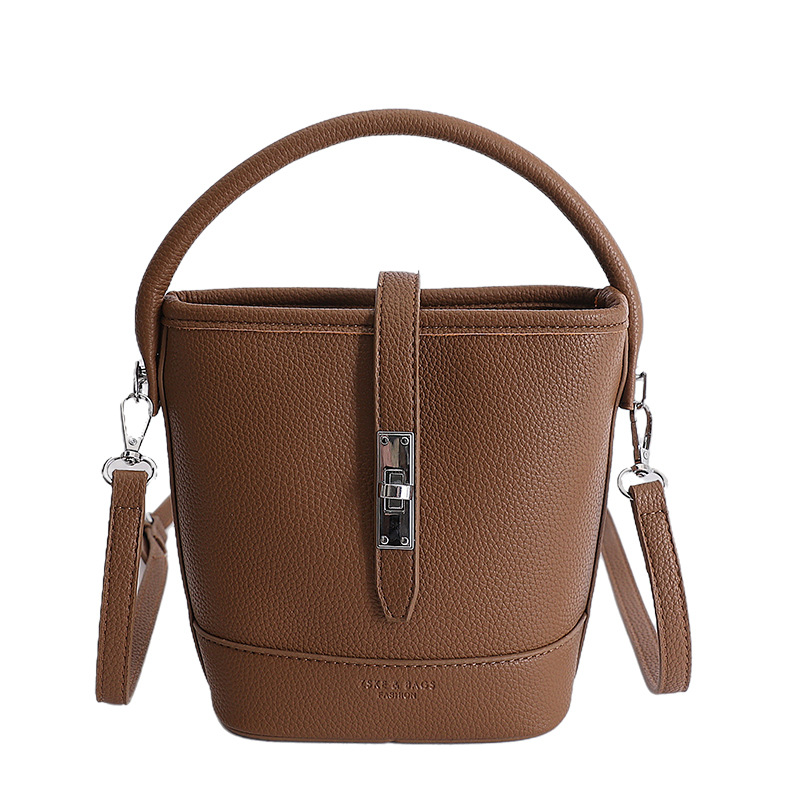 Litchi estampado bolso de cubo de mano mujer 2026 venta caliente nueva moda coreana alta textura mochila de hombro