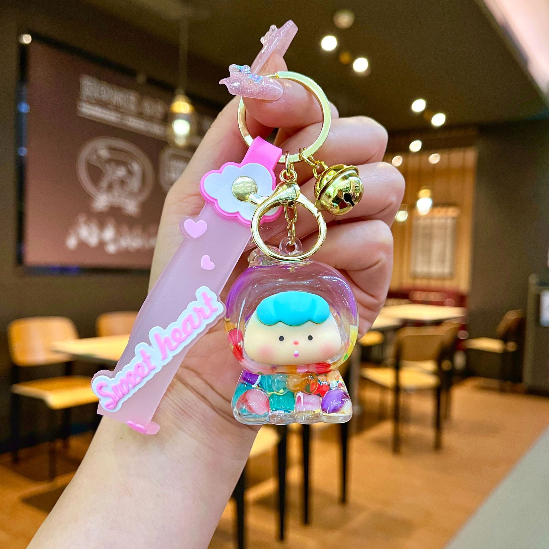 Nuevo llavero de dados luminosos con aceite, cuentas de burbujas, dados, colgantes de botella de arena de cristal, colgantes de bolsas al por mayor