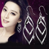 Copper silver fashionable long earrings with tassels, wholesale