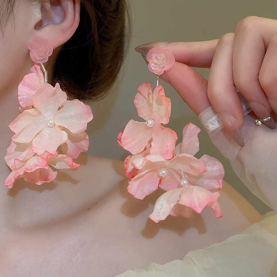 Pendientes de flor de lazo elegante de súper hada de plata Pendientes de moda de lujo ligero francés Pendientes de todo fósforo dulce de estilo literario