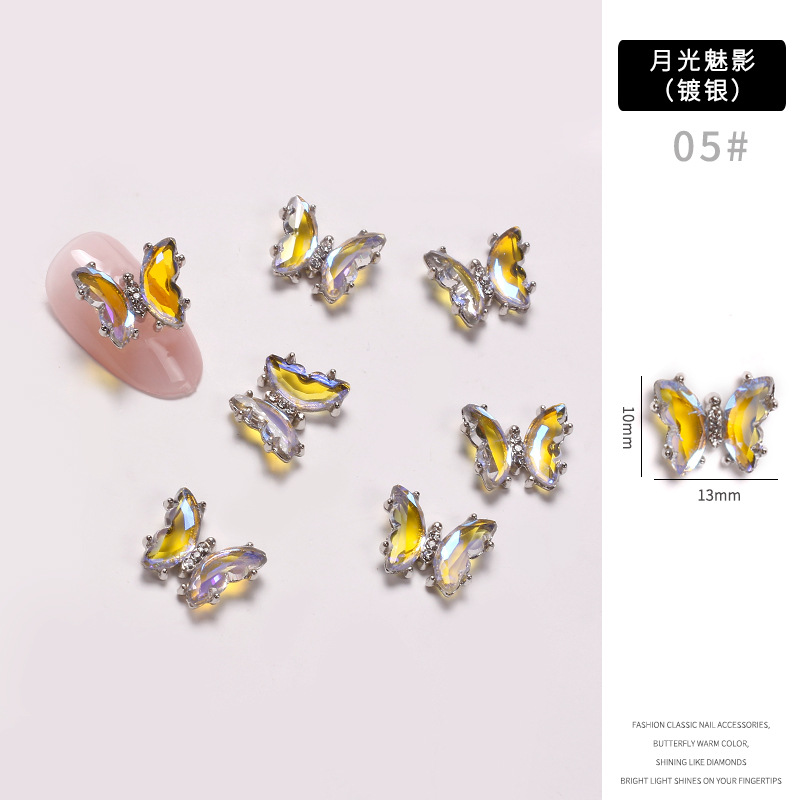 Red famosa nueva mariposa perforación joyas de manicura aleación tridimensional mariposa cristal permeación de hielo insins viento cristal mariposa perforación