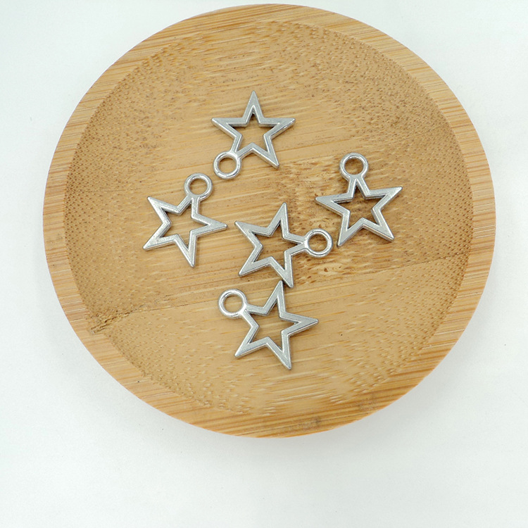 包包拉片 合金镂空星星文胸吊坠 五角星泳装内衣鸡心位饰品挂件