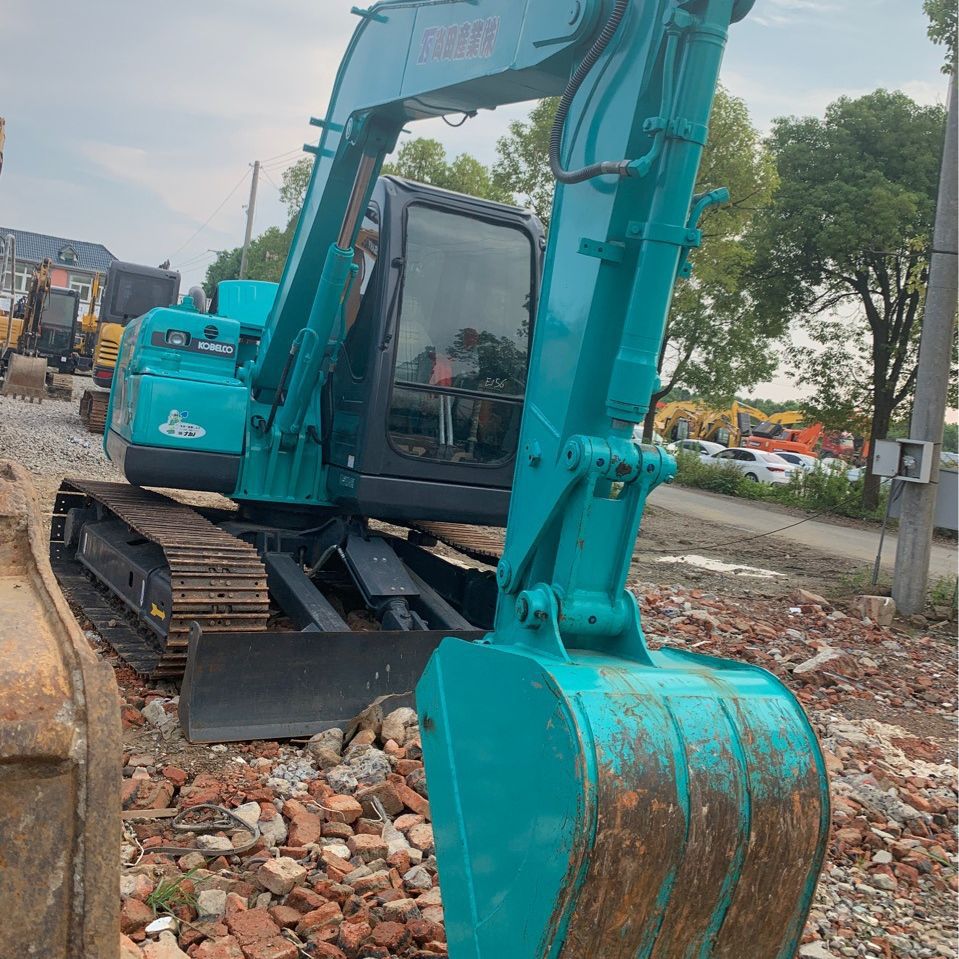 Exportación de comercio exterior de segunda mano Shengang 75 y 80 excavadoras con martillo de trituración original