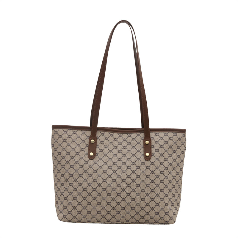 Bolso Tote personalizado de paso relajado de gran capacidad 2025 nuevo hermoso bolso de hombro de moda de nicho con textura bolso femenino