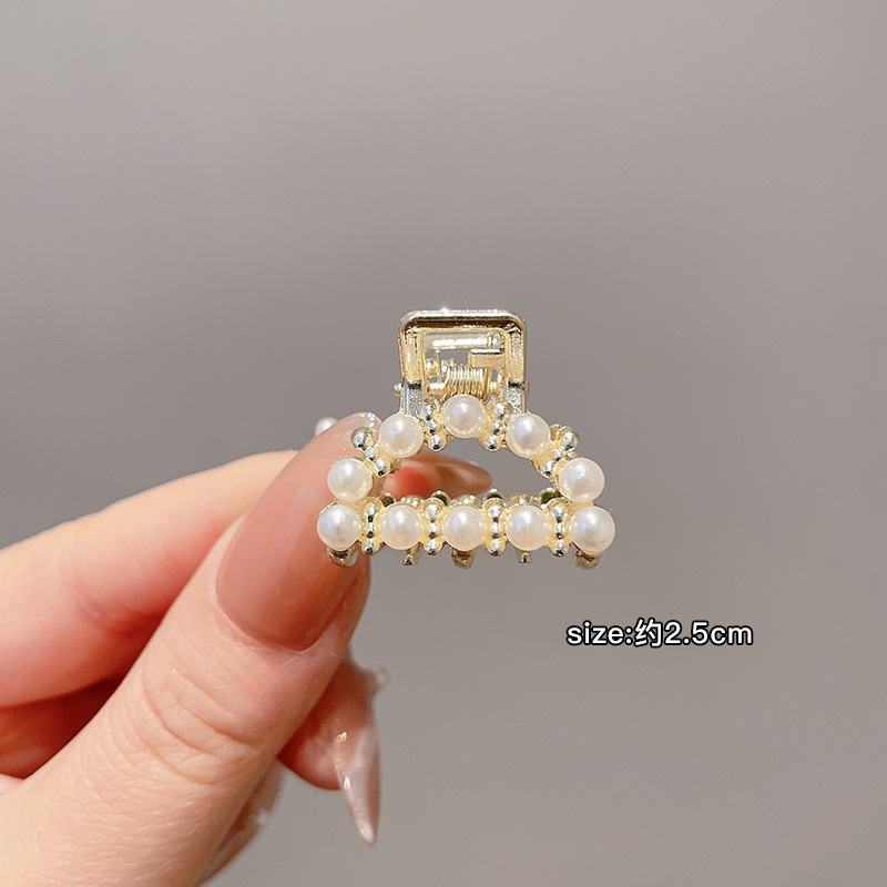 Pequeñas pinzas de cabello de perla temperamento feminino medio agarrado pinzas de cabello de borde pequeño adornamiento de cabeza de alto nivel no lastimar pinzas de cabello