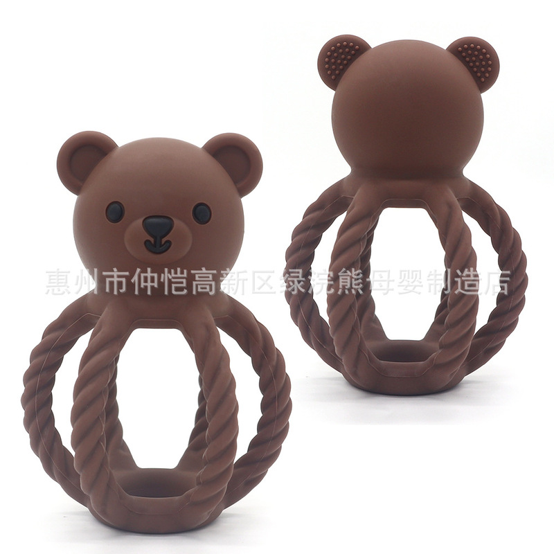 亚马逊新款硅胶材质牙胶婴儿口欲期磨牙防吃手硅胶咬咬乐安抚摇铃|undefined