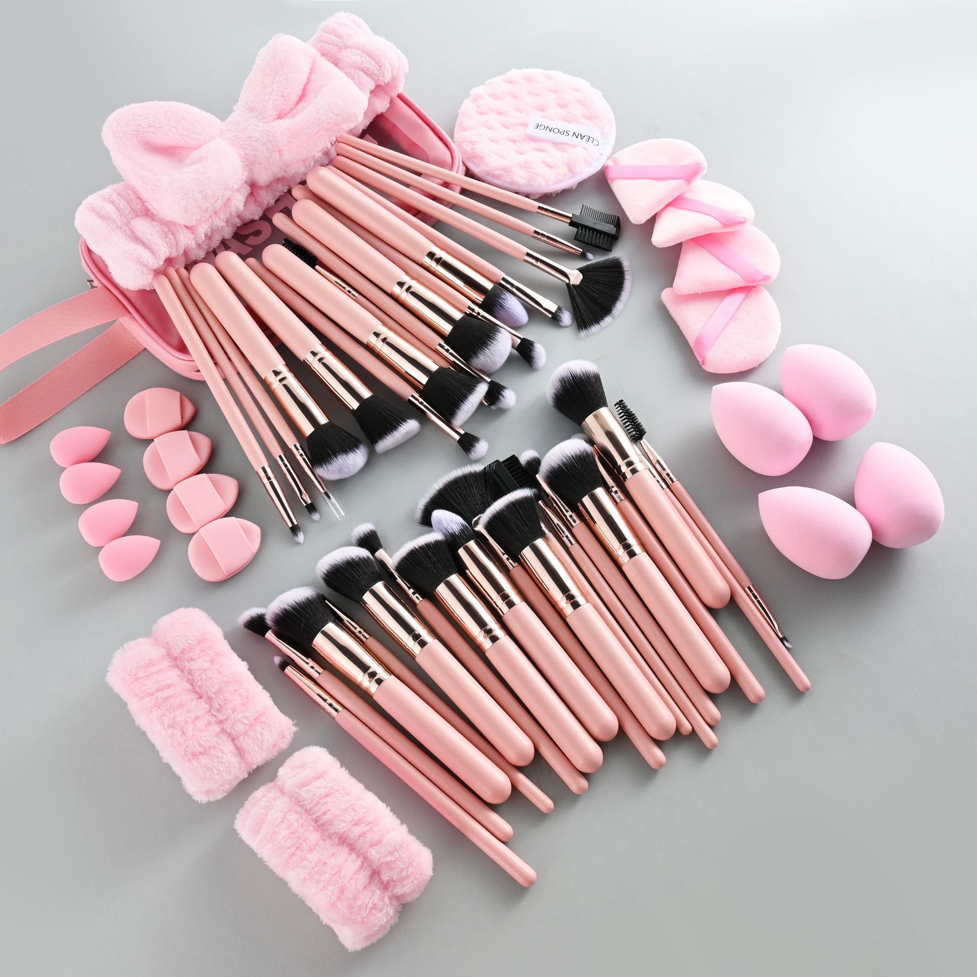 Amazon rosa 53 piezas de maquillaje lavado facial correa de cabello arco correa de cabello rosa esponja huevo cojín de aire